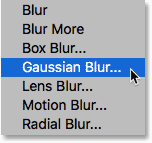 Choosing the Gaussian Blur filter from under the Filter menu