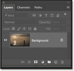The Layers panel in Photoshop showing the sunset photo on the Background layer